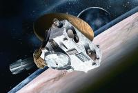 NASA опубликовало фото спутника Плутона, окутанного темнотой полярной ночи