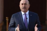 Глава МИД Турции назвал Макрона покровителем террористов