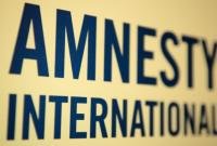 Белорусские силовики избивают мигрантов - Amnesty